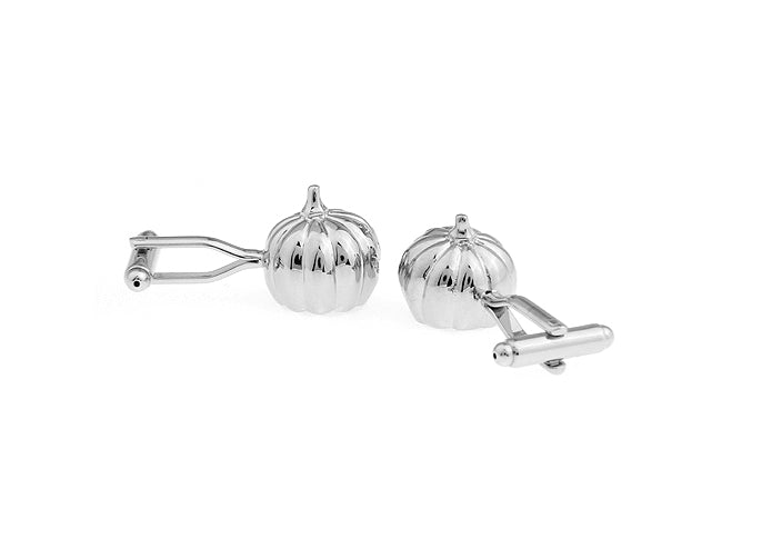 Silver pumpkin-shaped cufflinks on a white background