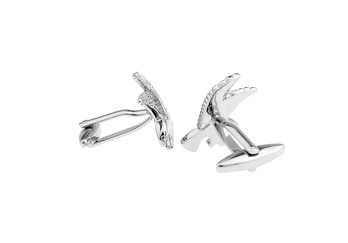 Silver anchor-shaped cufflinks on a white background