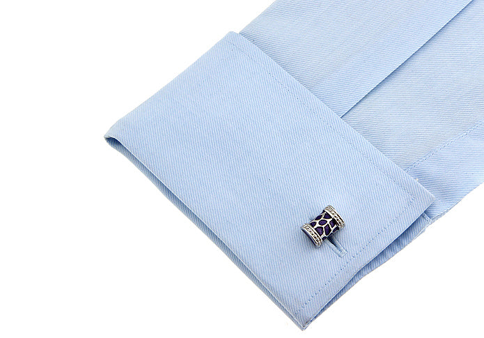 Close-up of JayPins silver barrel cufflinks with purple enamel mosaic design and crystal accents, luxury men’s accessory for formalwear.