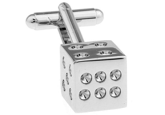 Silver dice-shaped cufflinks with gemstones on a white background