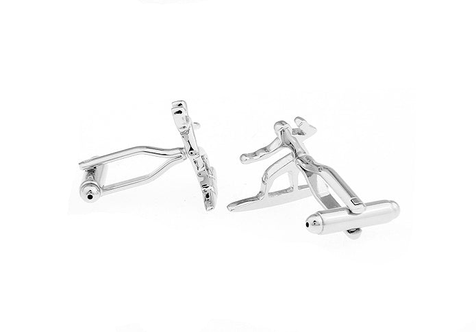Pair of silver cufflinks on a white background