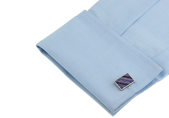 Close-up of JayPins rectangular silver cufflinks featuring purple enamel floral and diagonal stripe pattern, designed for modern and elegant men’s formalwear.