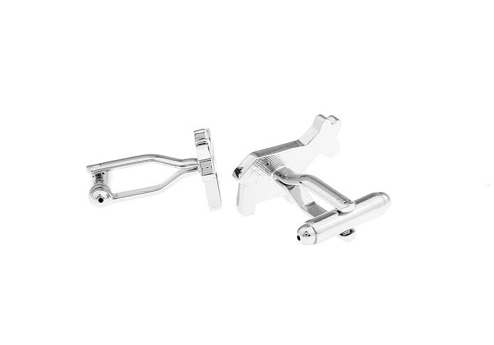 Silver cufflinks on a white background