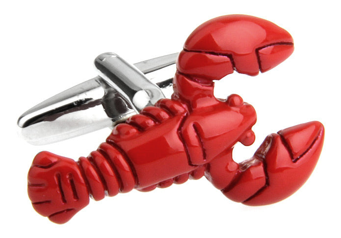 Red lobster-shaped cufflinks on a white background