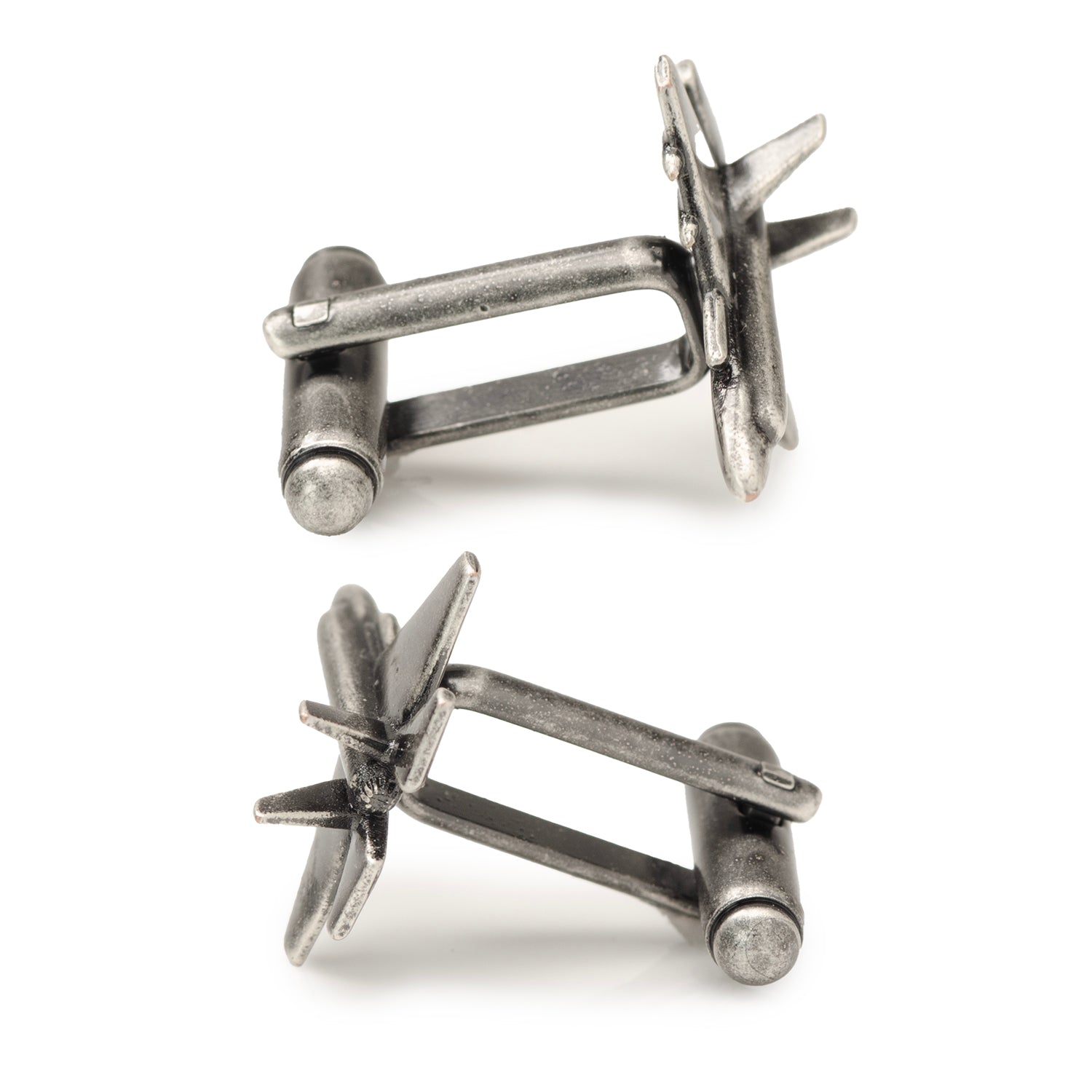 Pair of silver barbed wire cufflinks on a white background