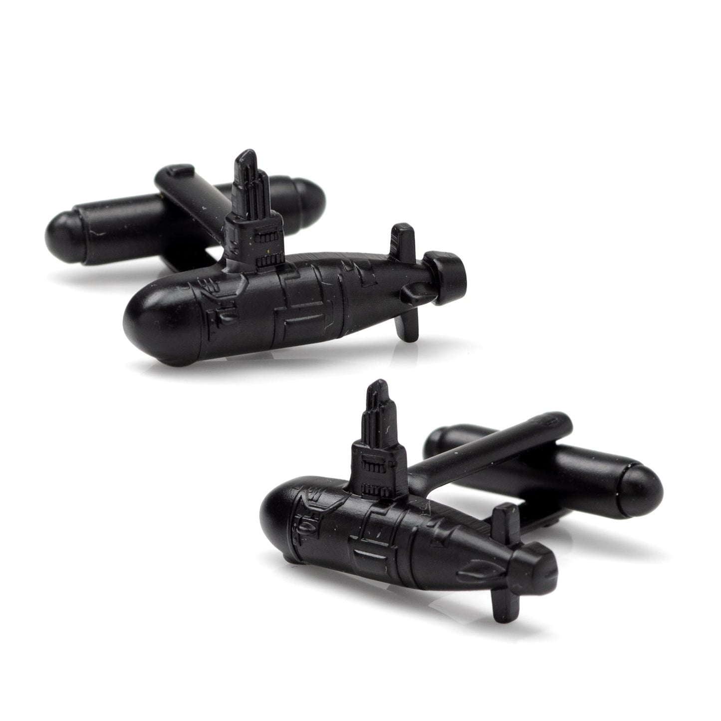 Black submarine-shaped cufflinks on a white background