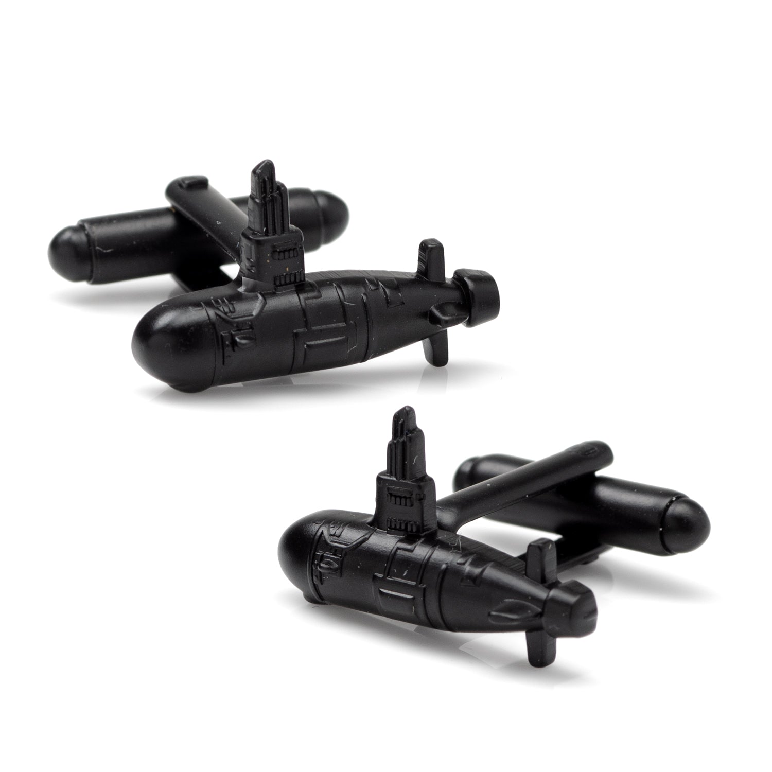 Black submarine-shaped cufflinks on a white background
