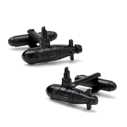 Black submarine-shaped cufflinks on a white background