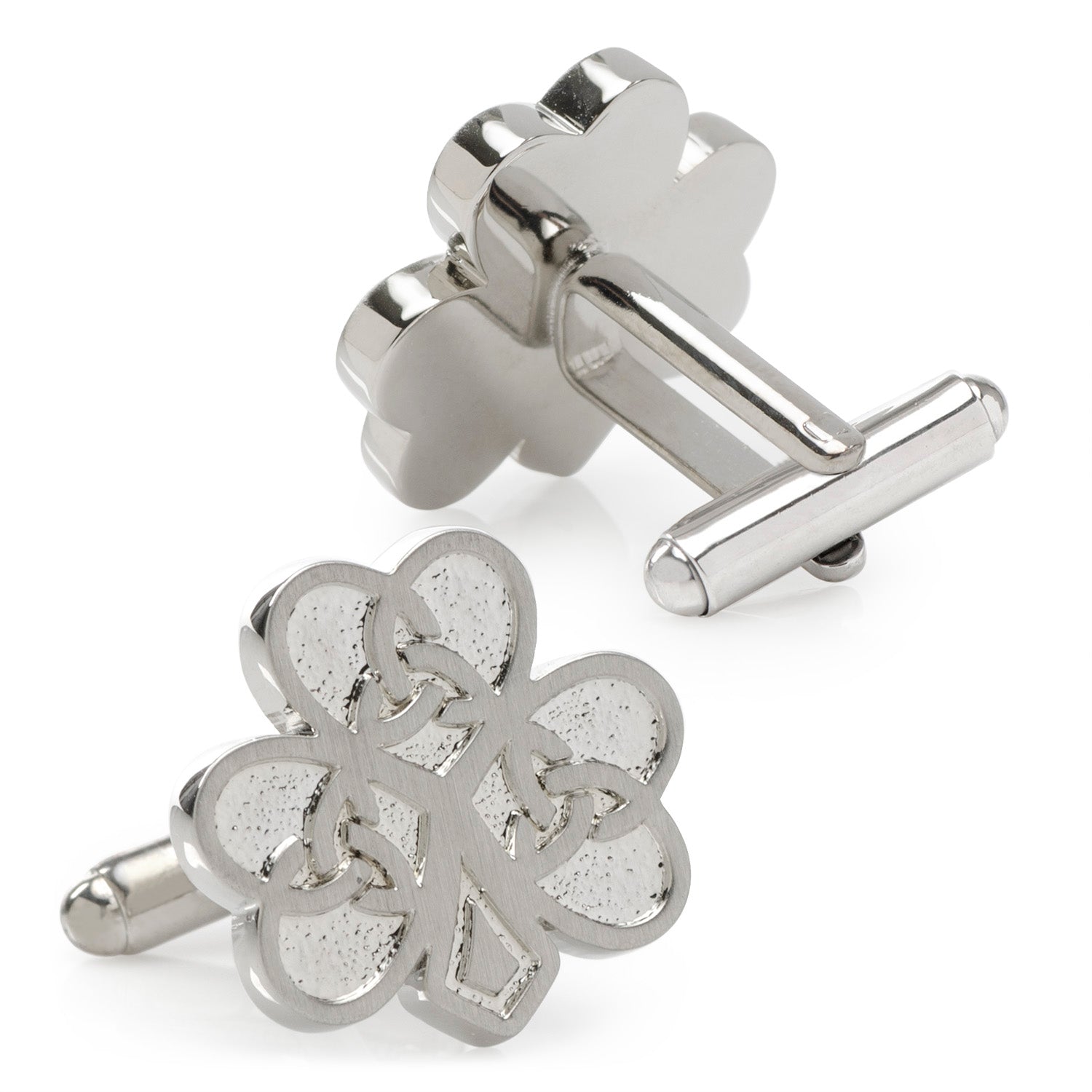 Silver shamrock cufflinks on a white background