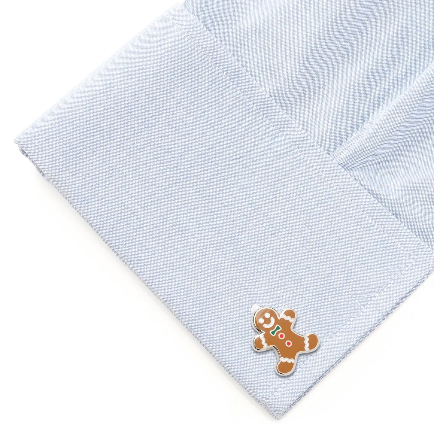 Light blue fabric with a gingerbread man design on a white background