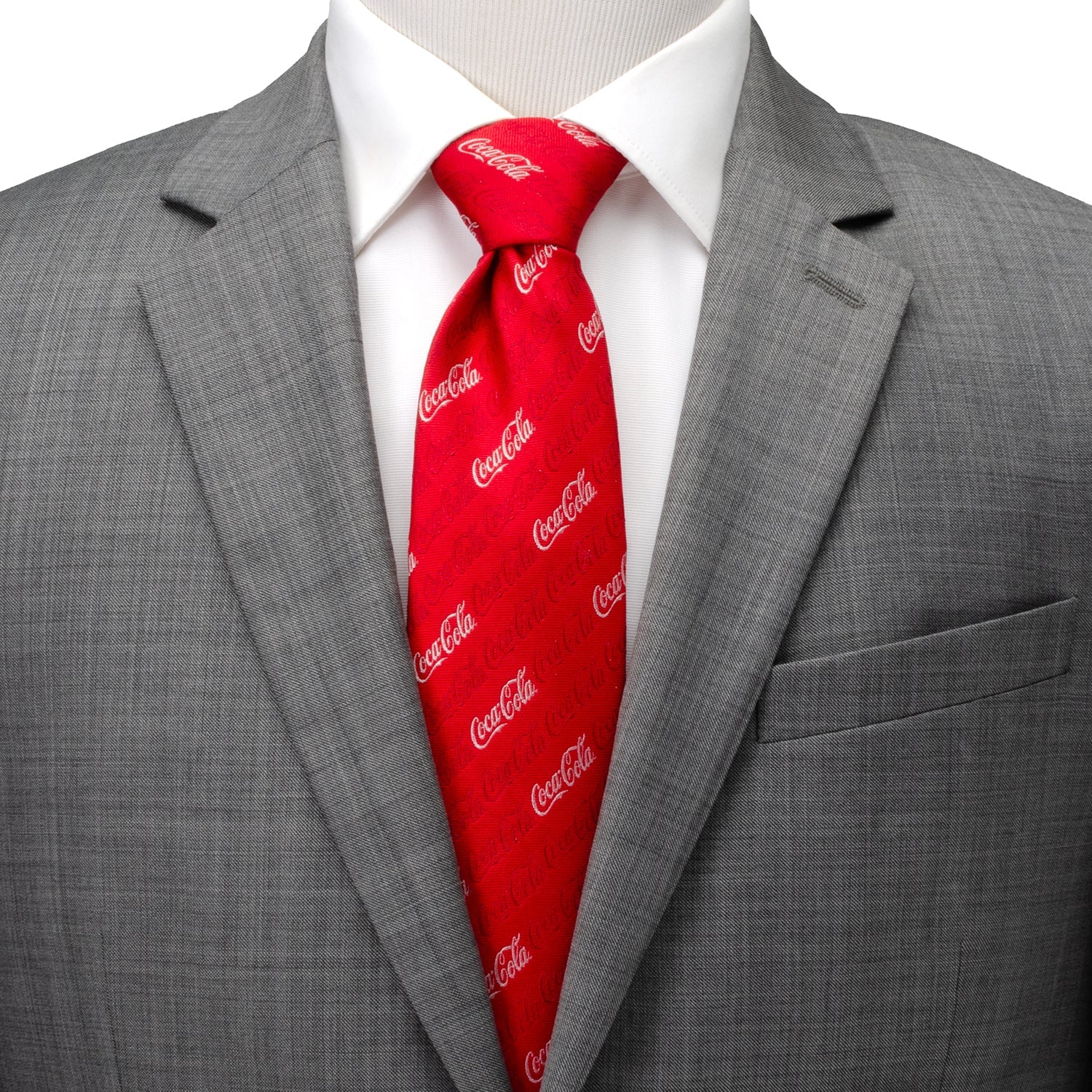 Gray suit with a red Coca-Cola tie on a mannequin