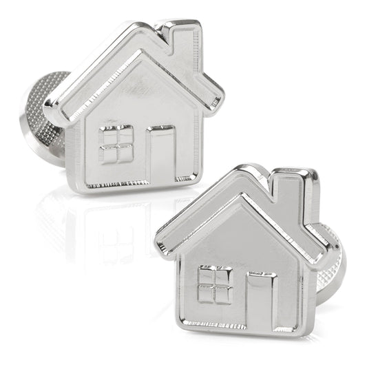 Silver house-shaped cufflinks on a white background