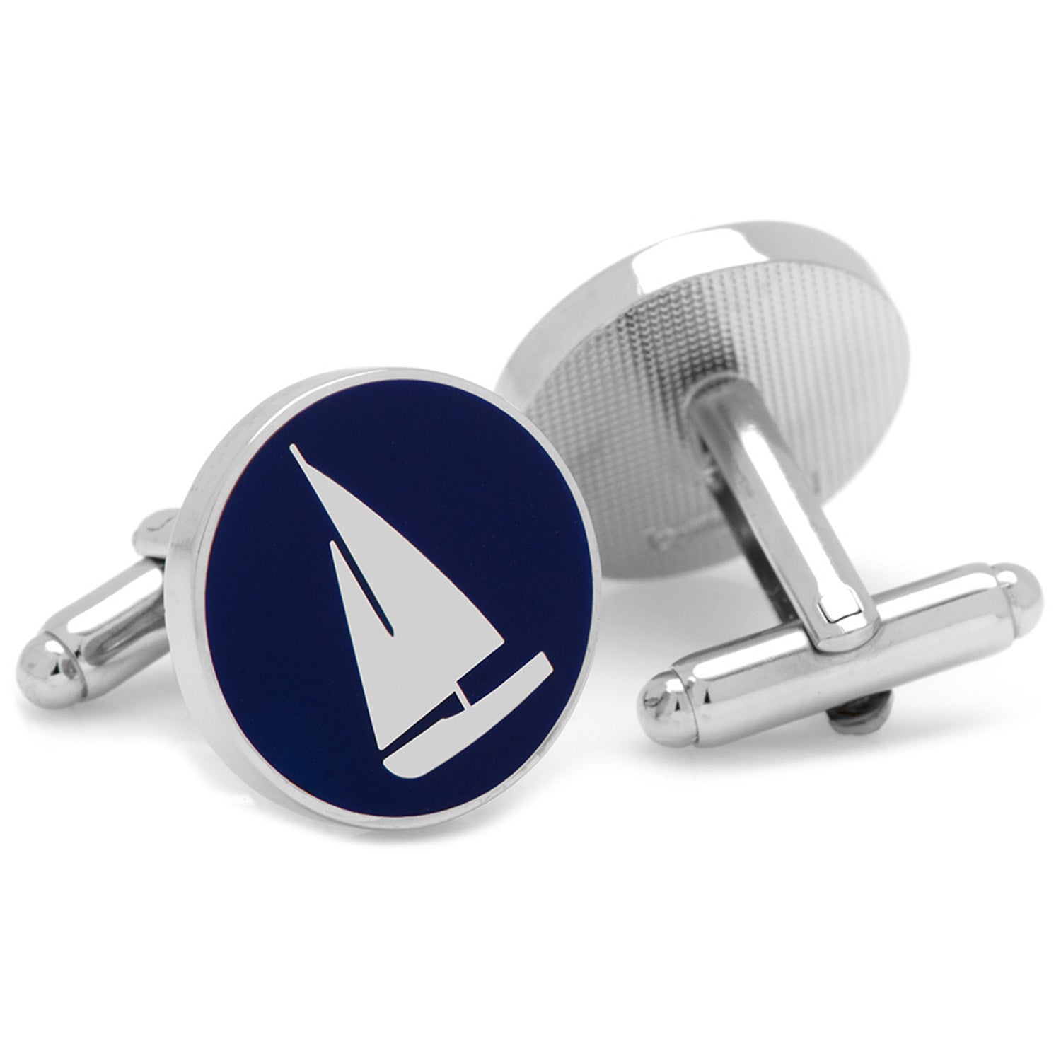 Cufflinks with a sailboat design on a blue background