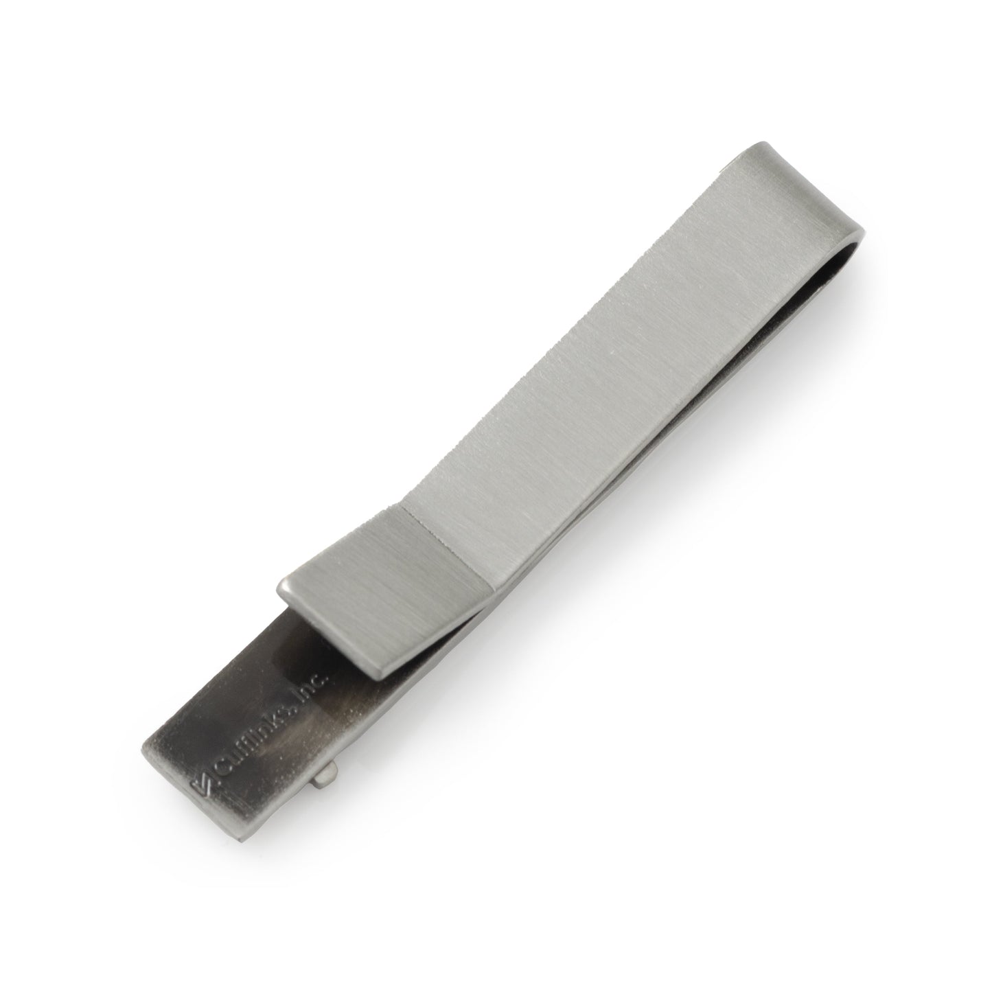 Metallic tie clip on a white background