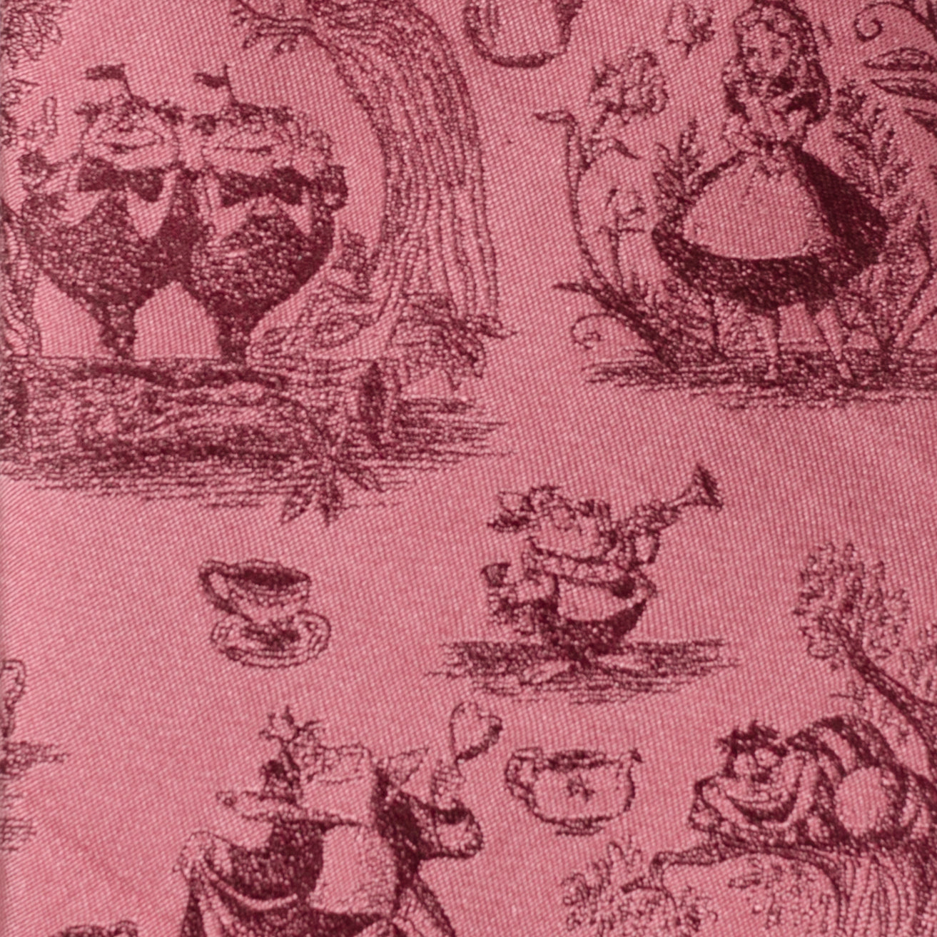 Patterned fabric with characters and objects from a famous children's book on a pink background Alice in Wonderland