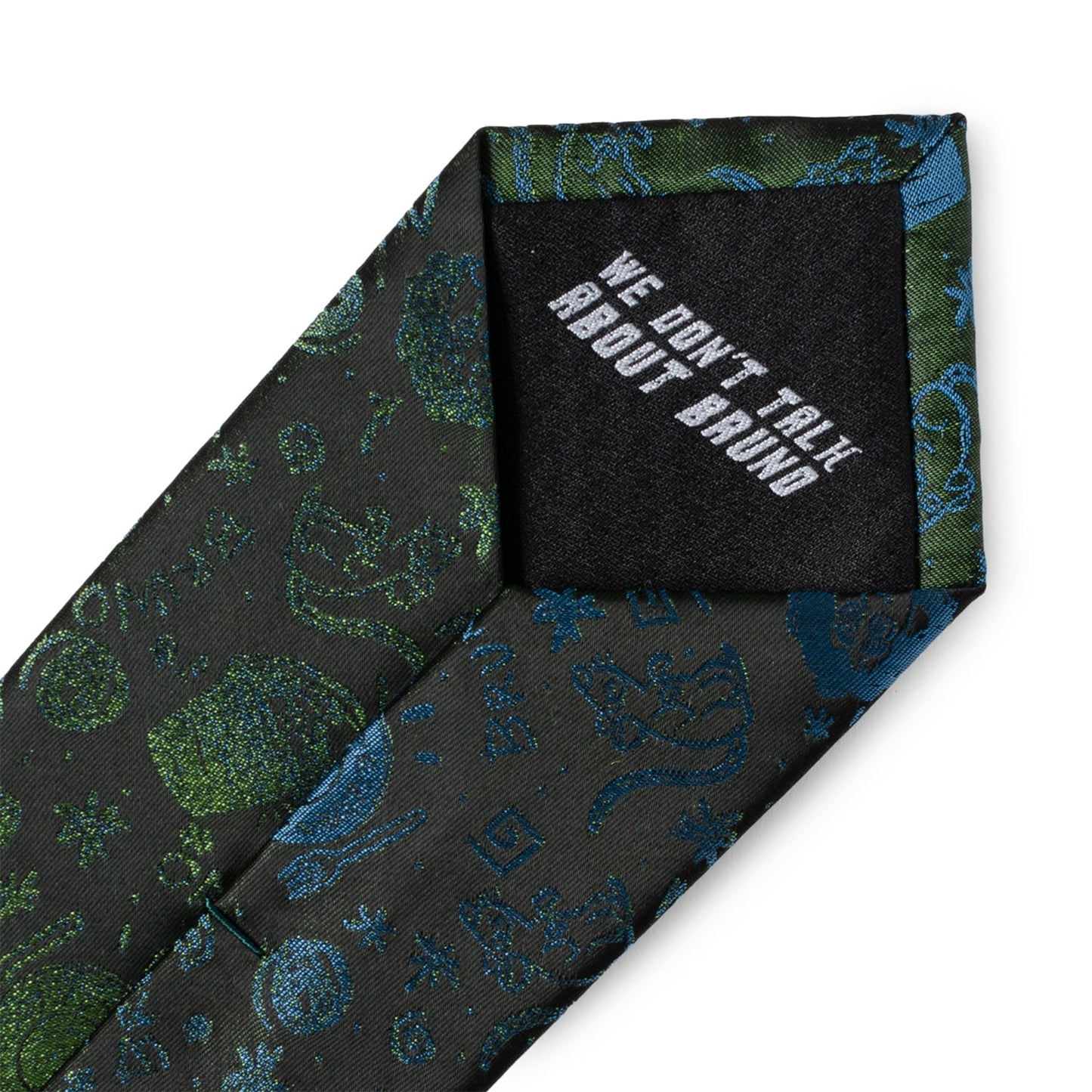 Patterned tie with a black patch displaying 'WE DON'T TALK ABOUT BRUDDA' on a white background
