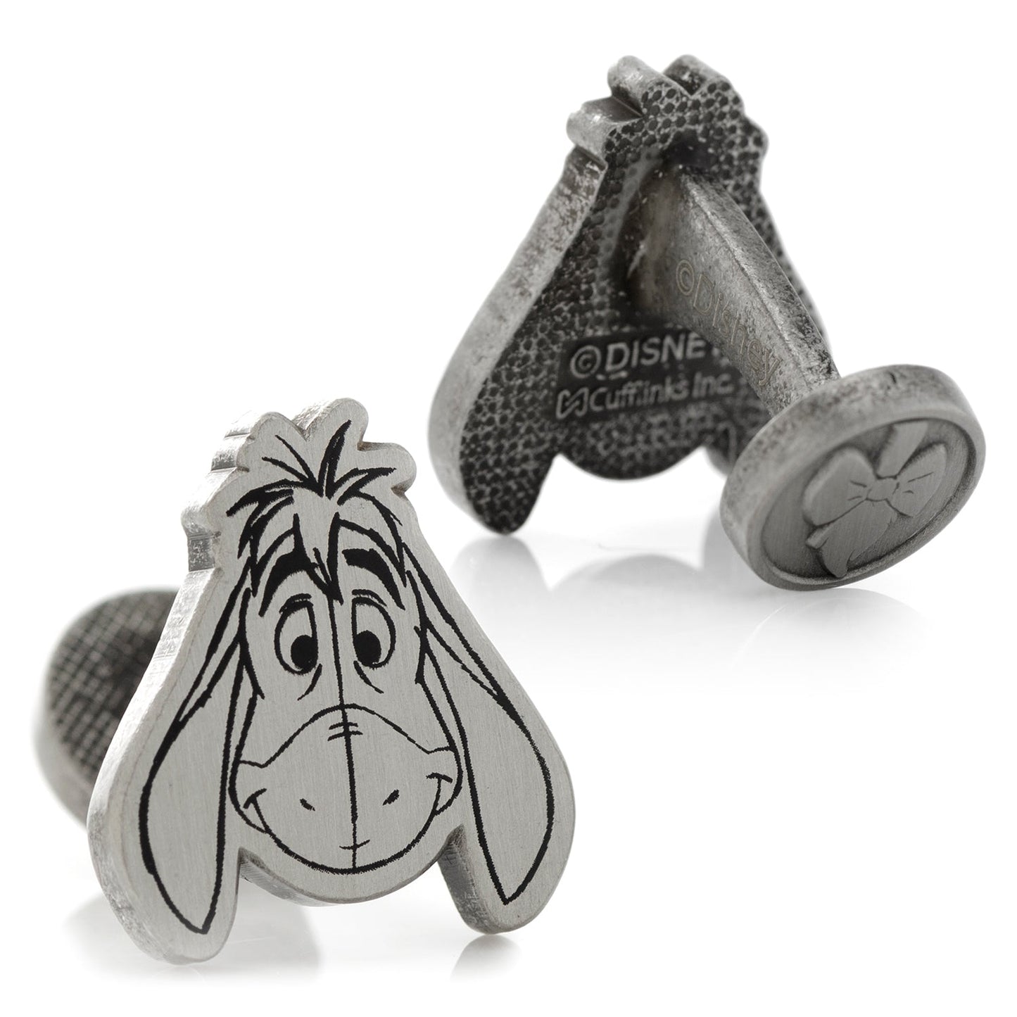 Cufflinks with Eeyore design on a white background