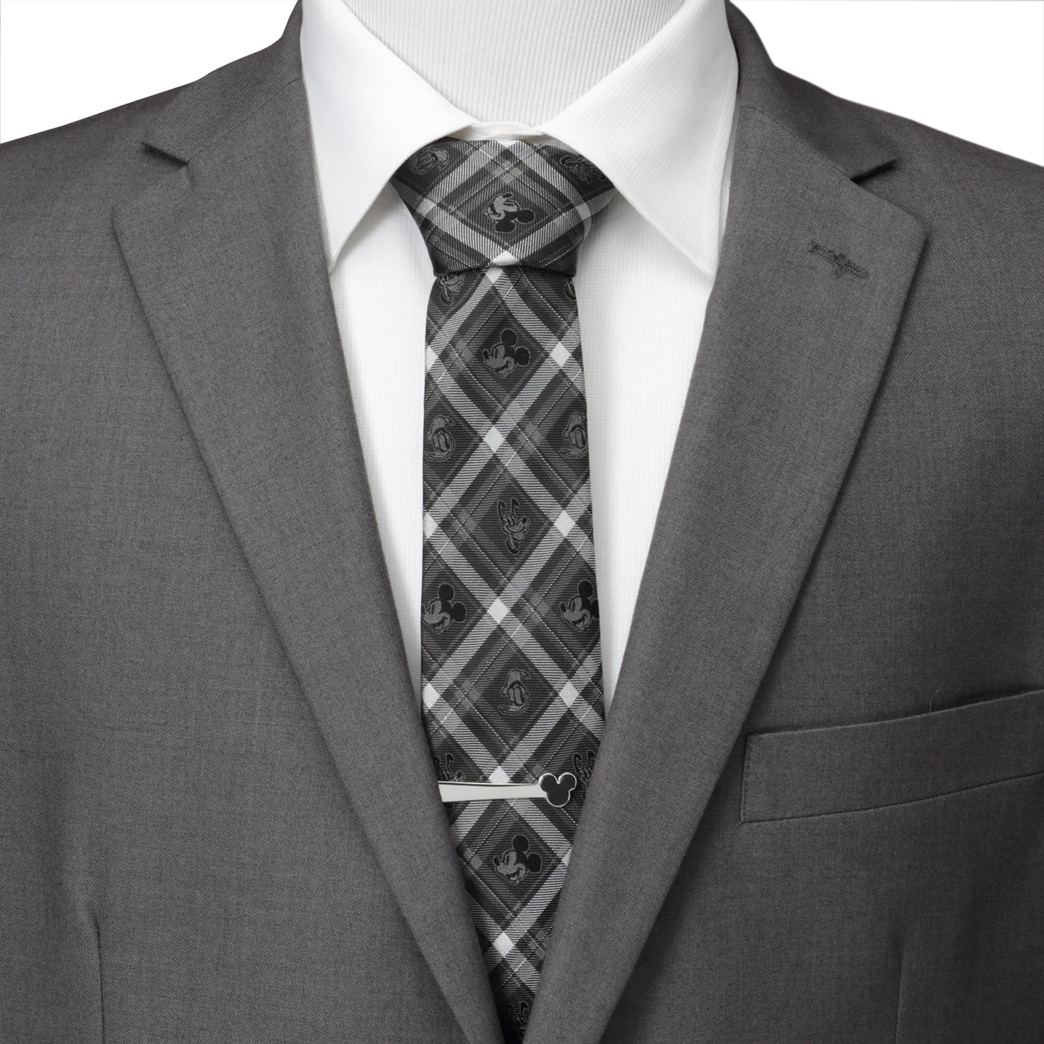 Gray suit with a patterned tie on a mannequin