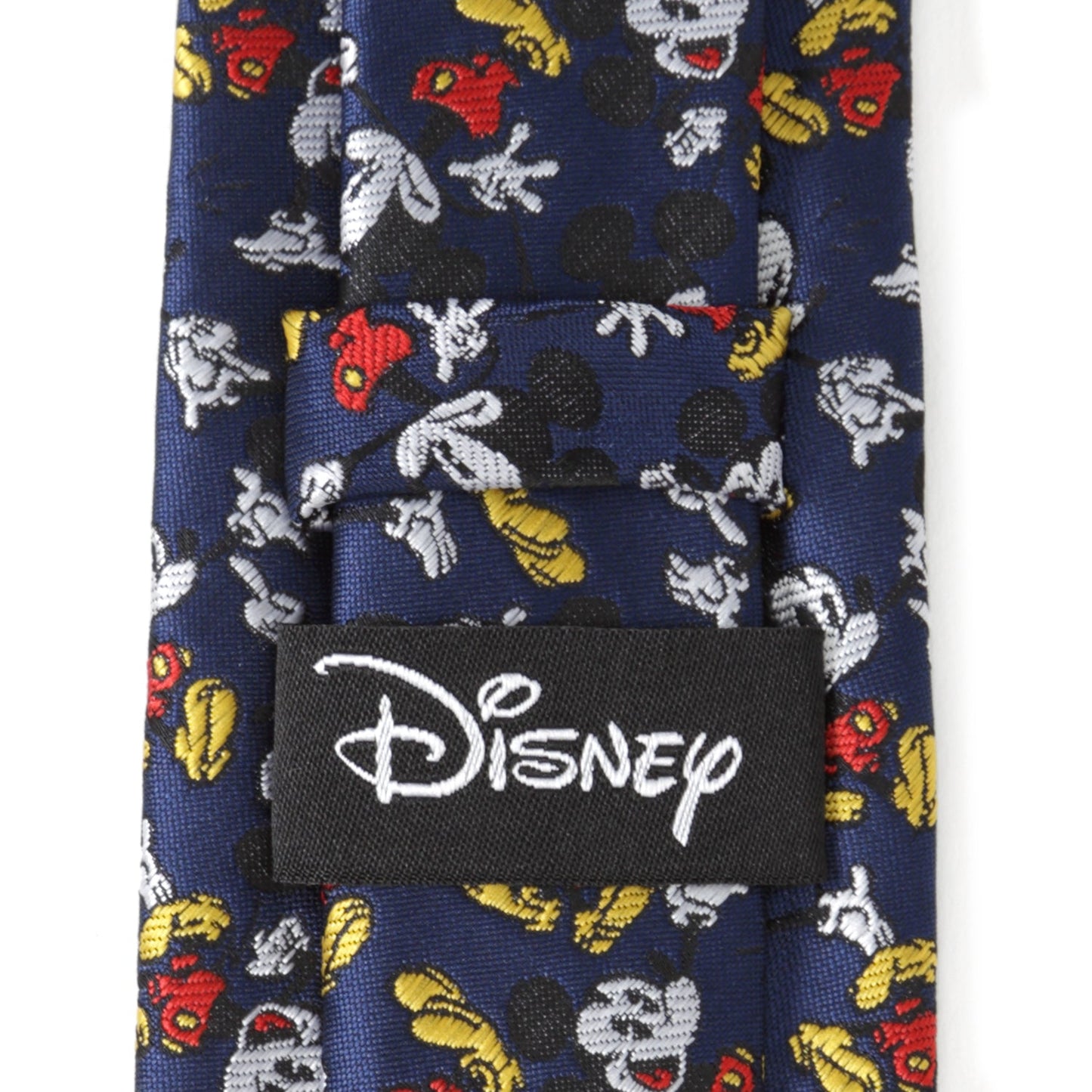 Disney-themed tie with character patterns on a blue background