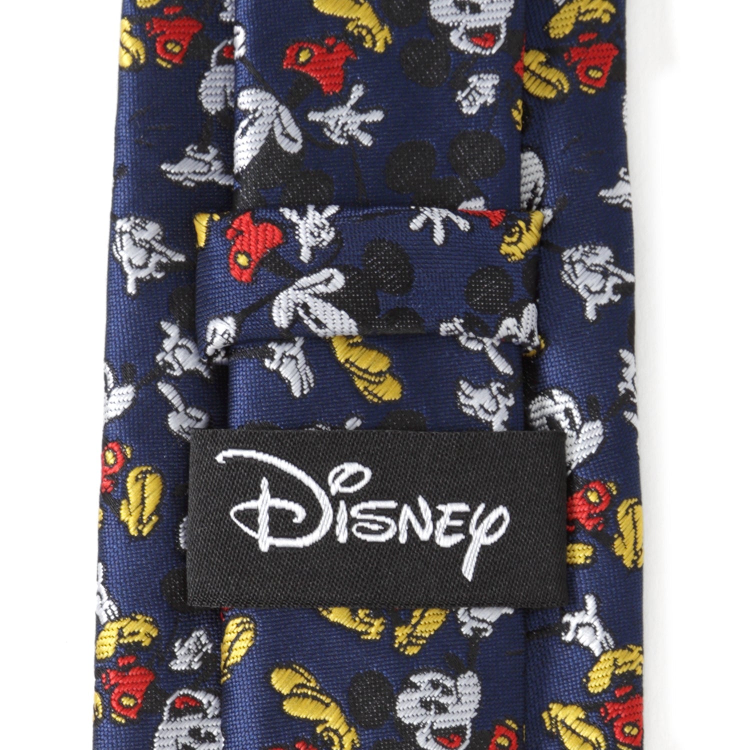 Disney-themed tie with character patterns on a blue background