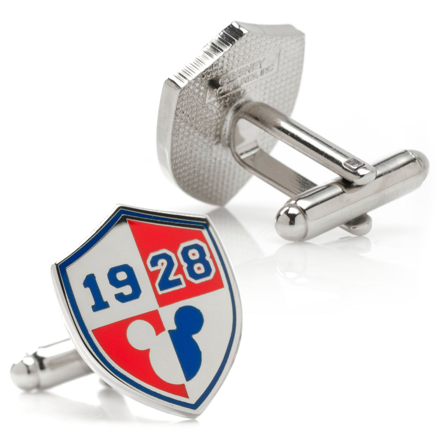 Cufflinks with a shield design featuring the year 1928 and two figures, on a white background.