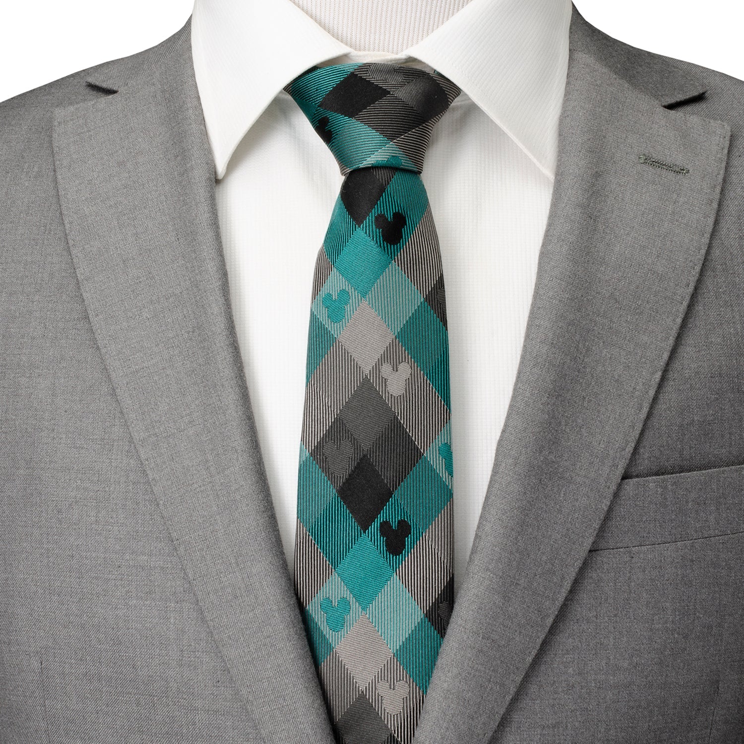 Disney Mickey Mouse teal plaid silk men’s tie featuring woven Mickey silhouette pattern. Officially licensed by Disney.