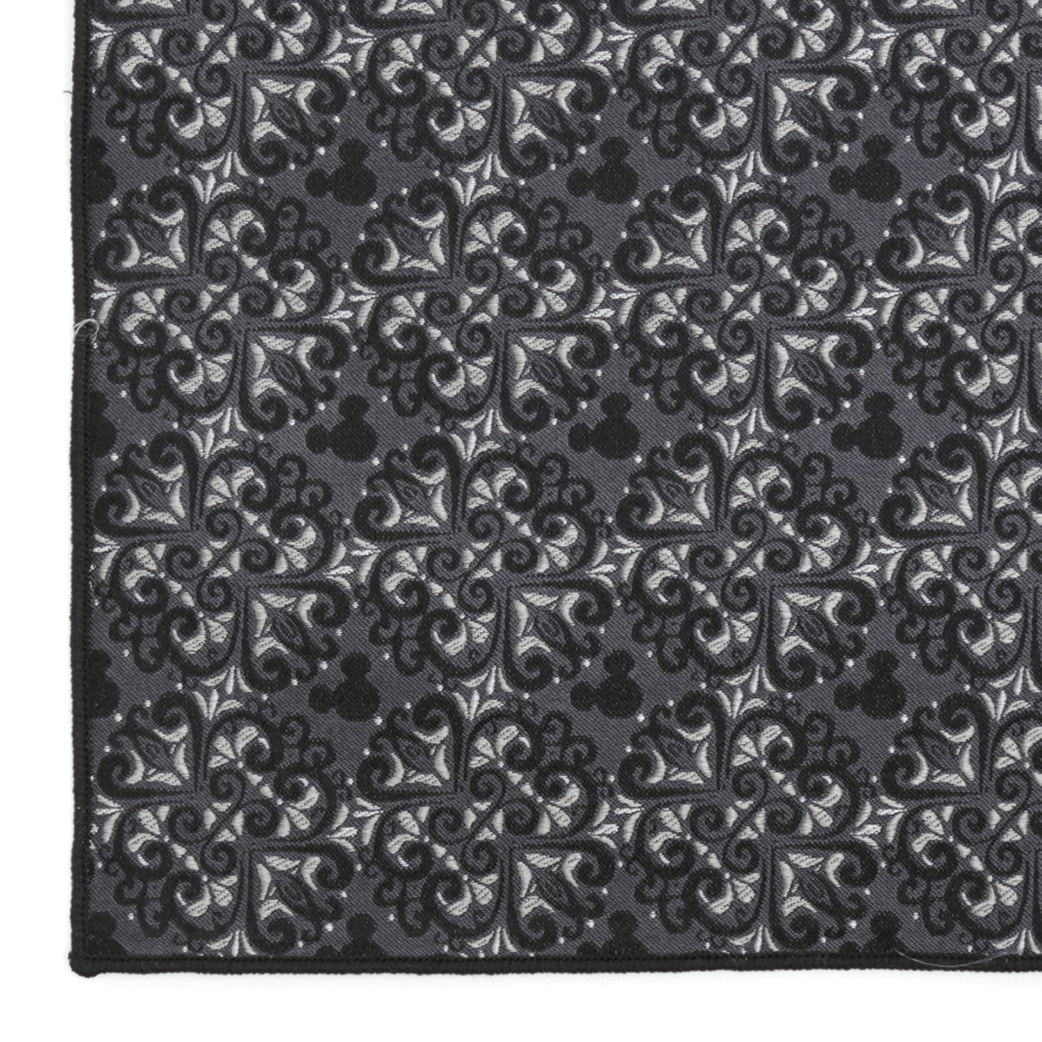 Black and white patterned fabric with Mickey Mouse logo Hidden Mickey house
