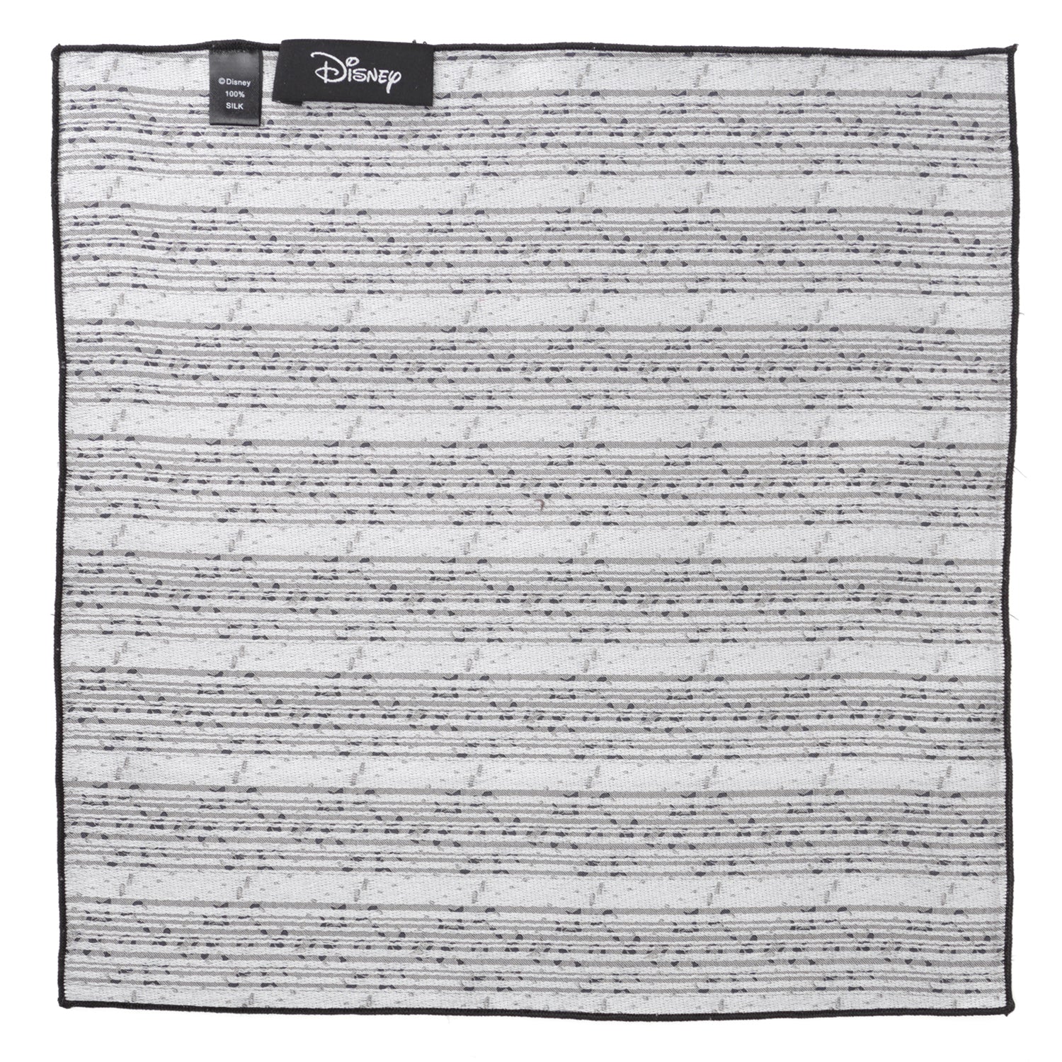 Black and white patterned blanket with Disney logo on a black border