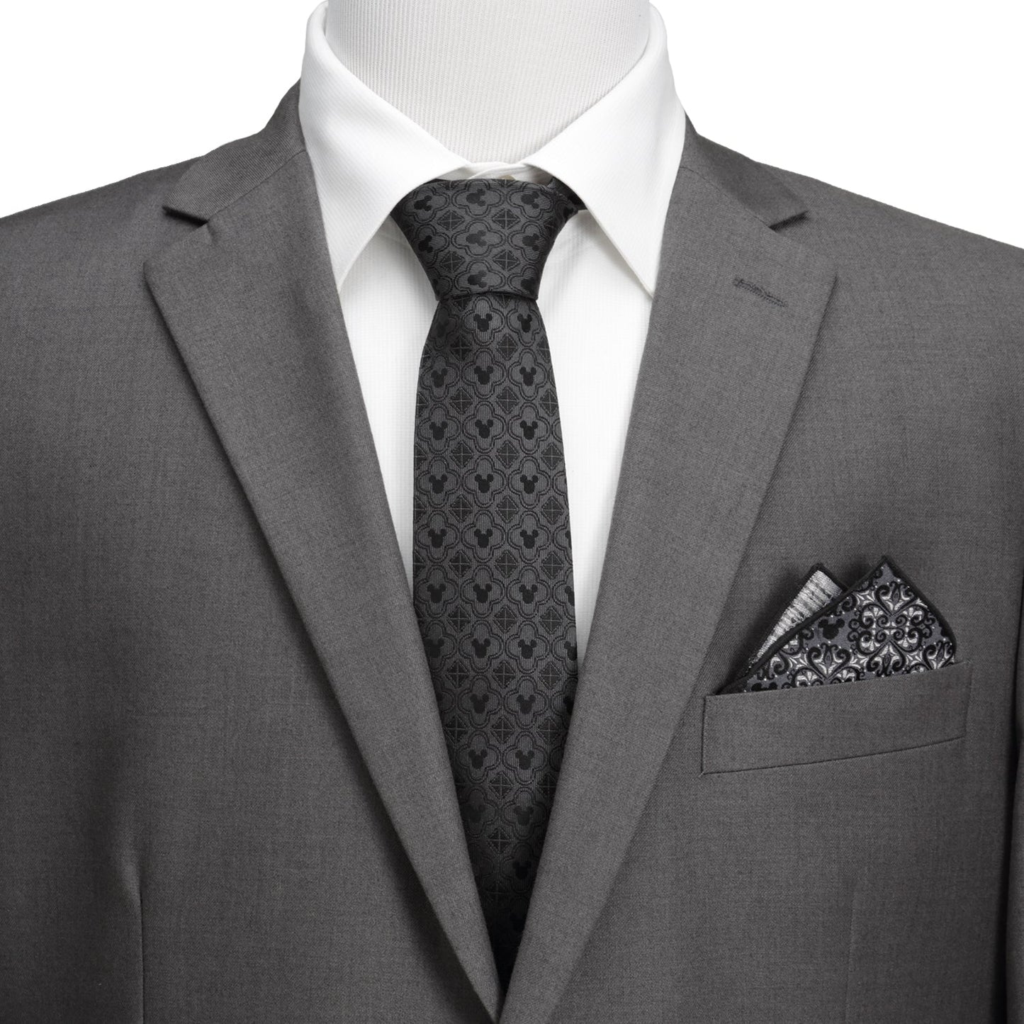 Disney Mickey Mouse Black Pattern Silk Men’s Tie featuring subtle woven Mickey silhouettes and geometric shapes. Officially licensed by Disney.