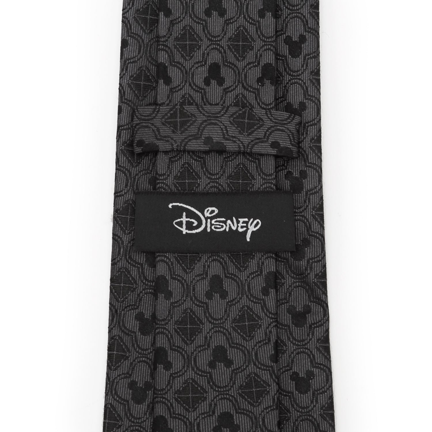 Disney Mickey Mouse Black Pattern Silk Men’s Tie featuring subtle woven Mickey silhouettes and geometric shapes. Officially licensed by Disney.