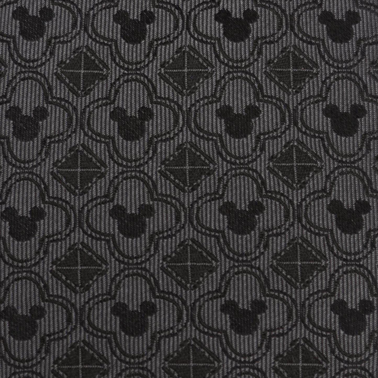 Disney Mickey Mouse Black Pattern Silk Men’s Tie featuring subtle woven Mickey silhouettes and geometric shapes. Officially licensed by Disney.