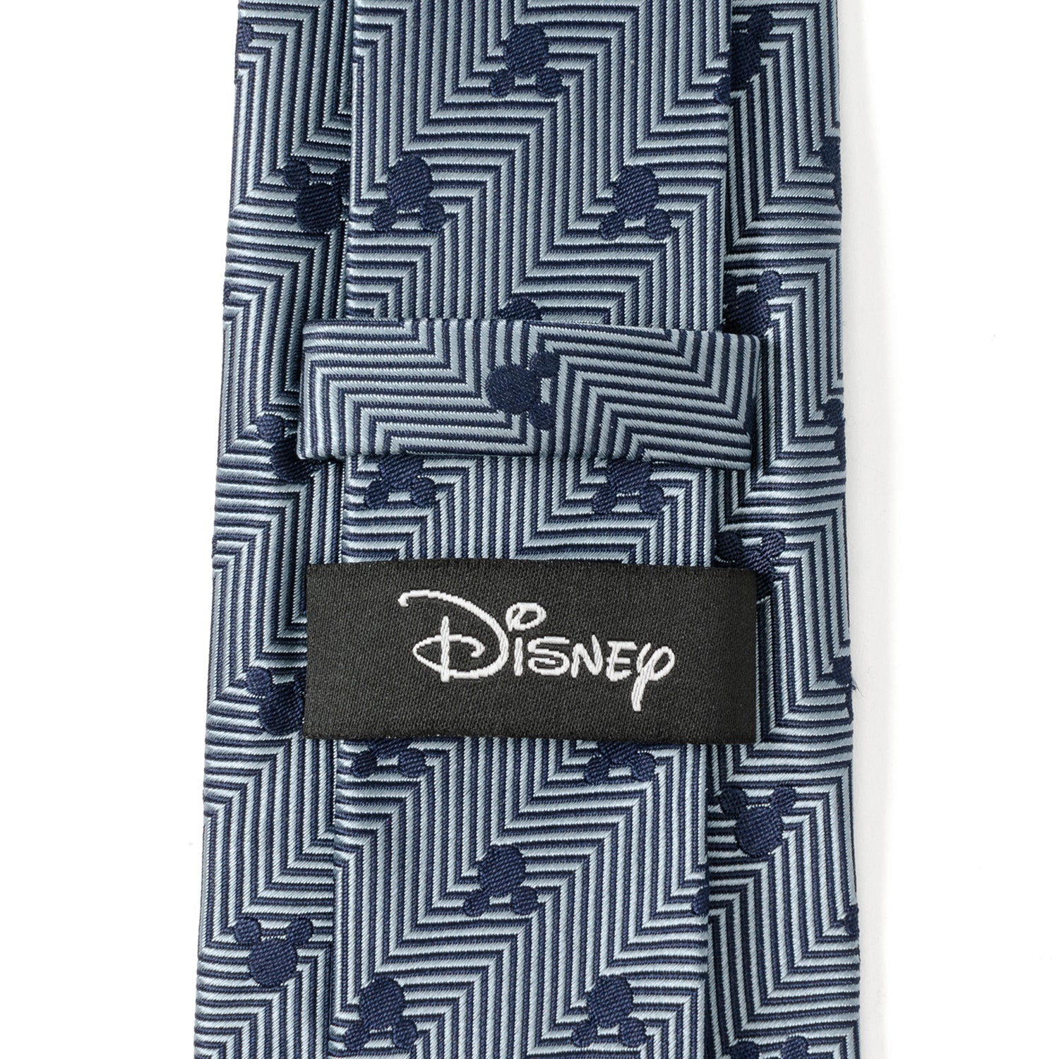 Navy tie with white zigzag pattern and small Mickey Mouse heads, featuring a Disney label.