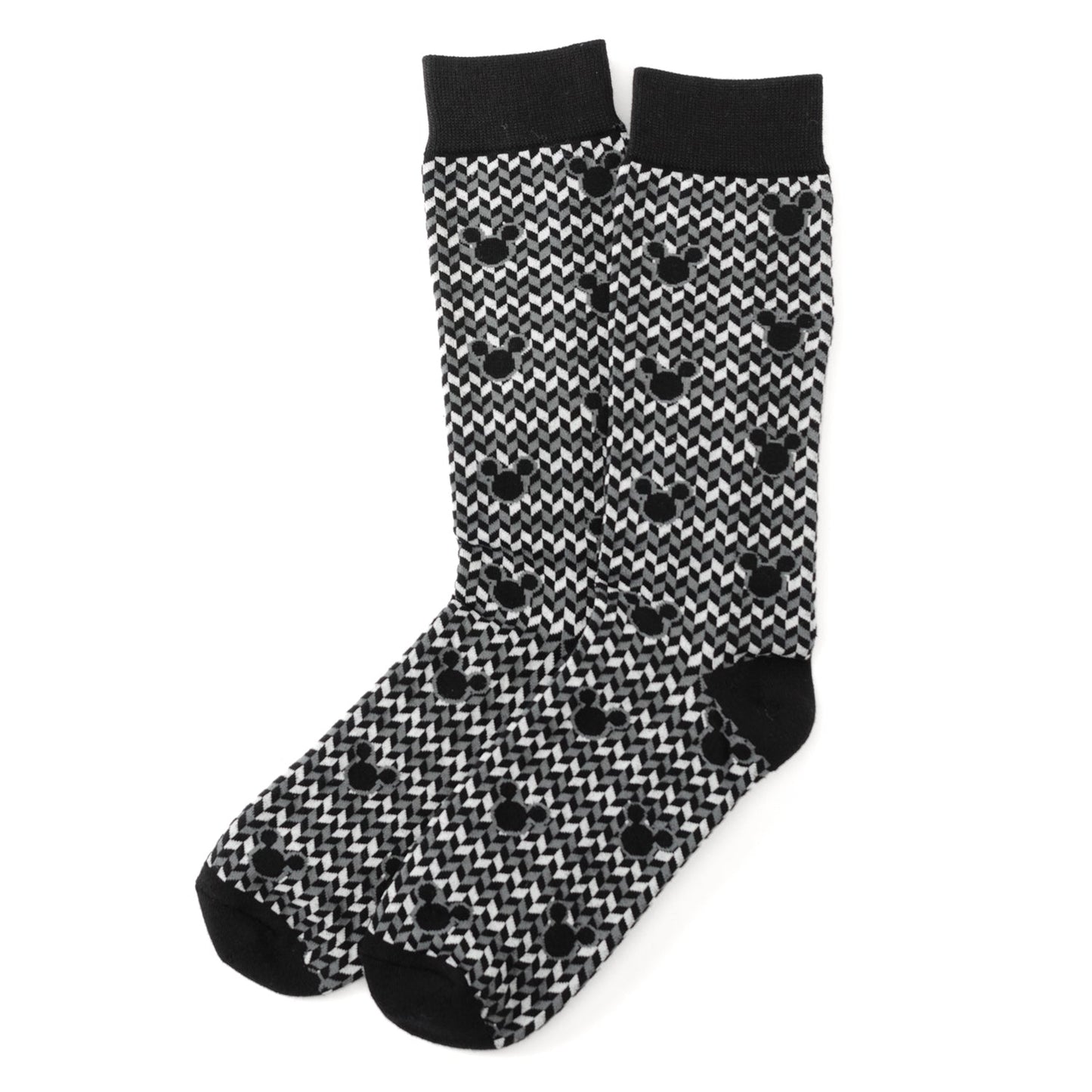 Black and white patterned socks with black toes and cuffs on a white background