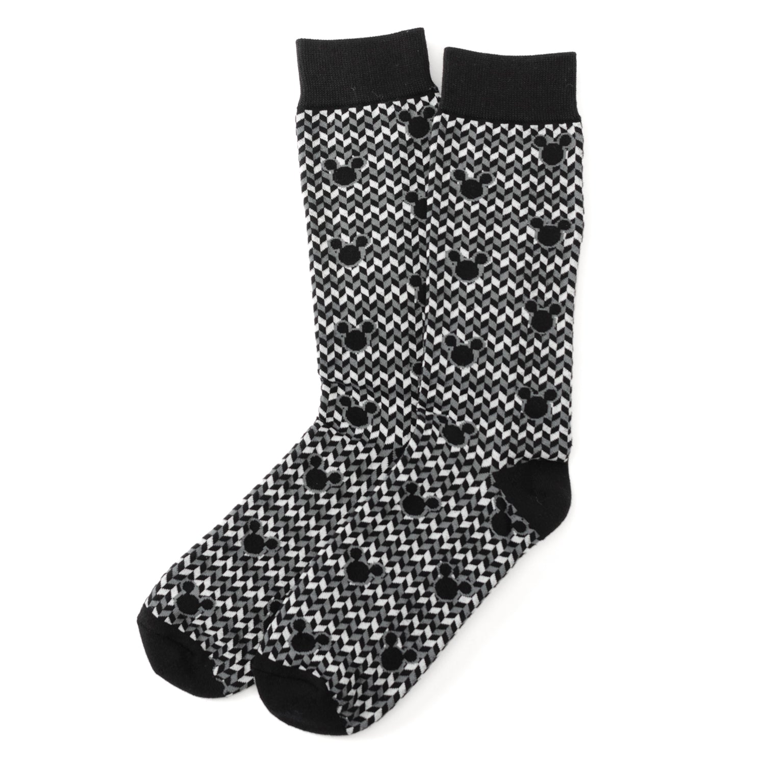 Black and white patterned socks with black toes and cuffs on a white background
