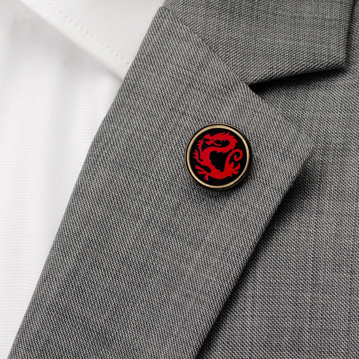 Disney Mulan Mushu Emblem Lapel Pin featuring red dragon design on black and gold base. Officially licensed by Disney.