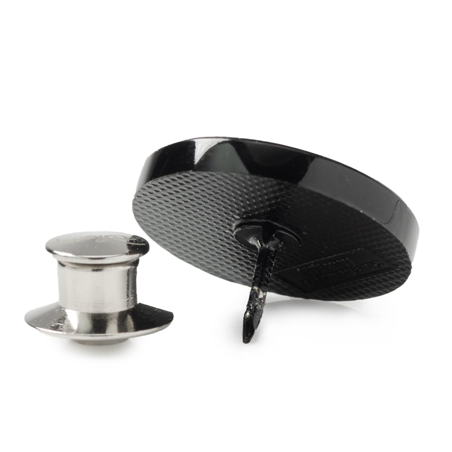 Black and silver metal components on a white background