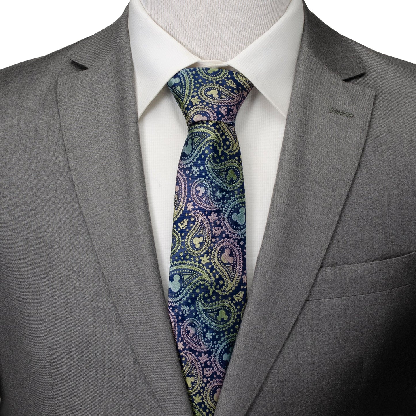 Gray suit with a colorful paisley tie on a mannequin