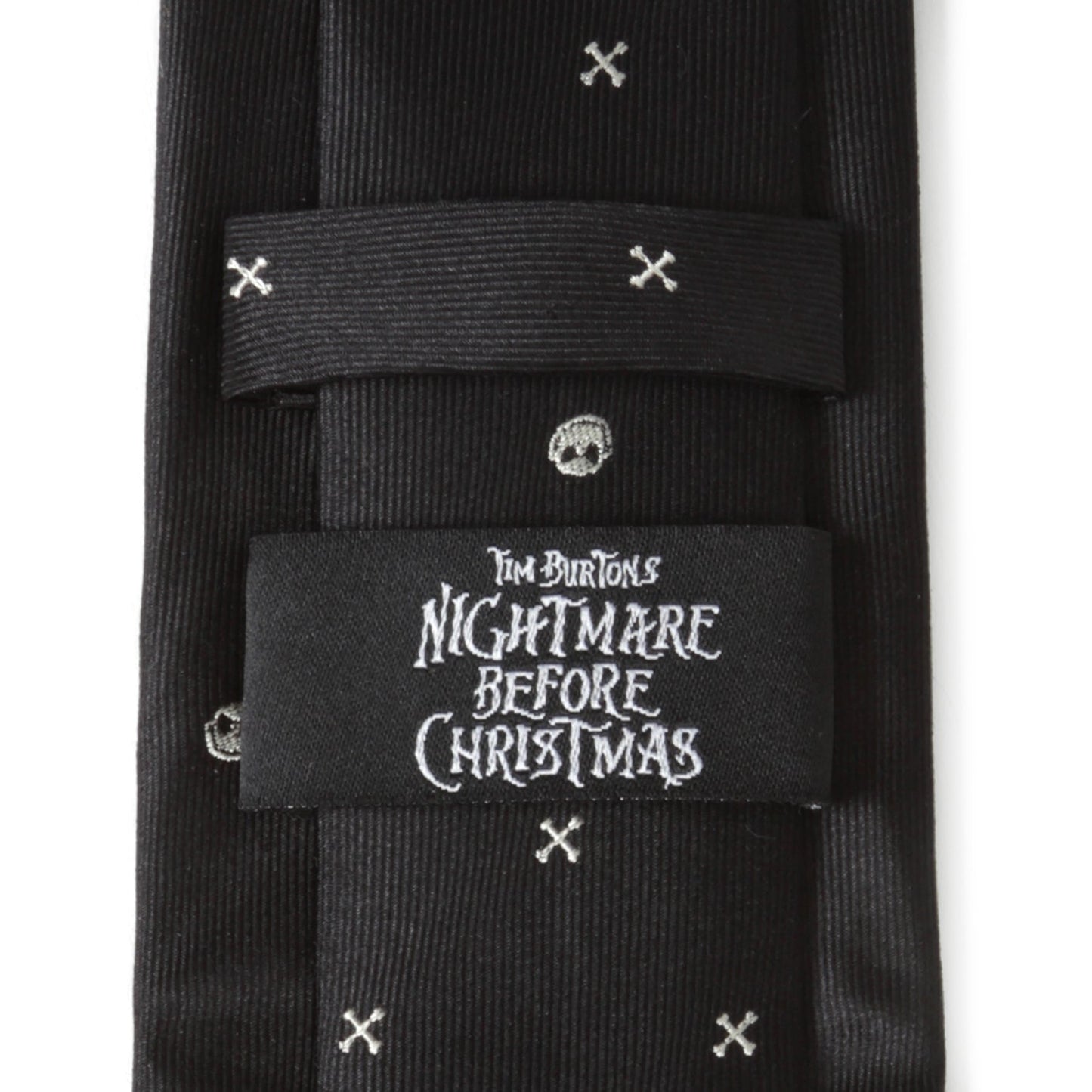 Black tie with white patterns and 'Tim Burton's Nightmare Before Christmas' label on a white background