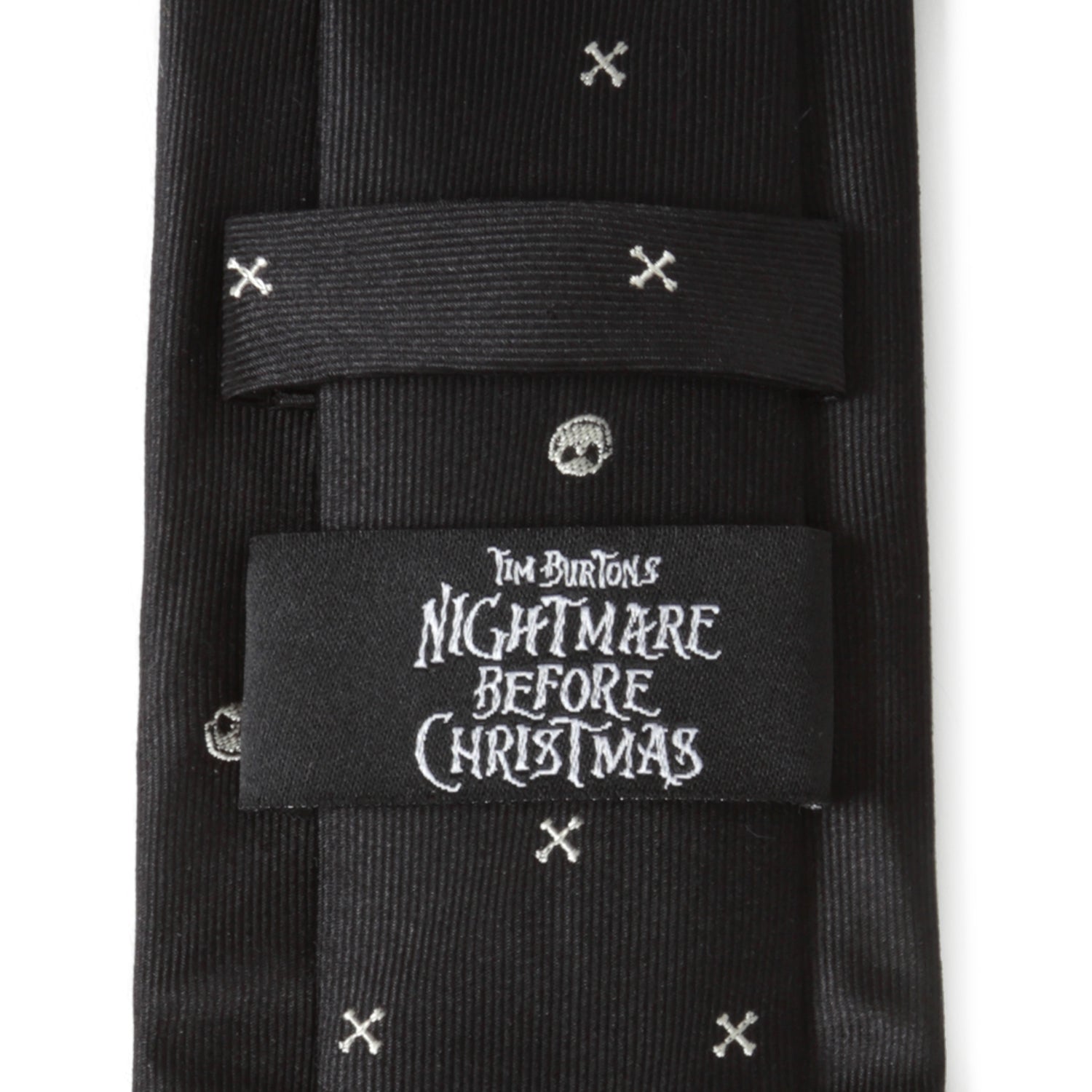 Black tie with white patterns and 'Tim Burton's Nightmare Before Christmas' label on a white background