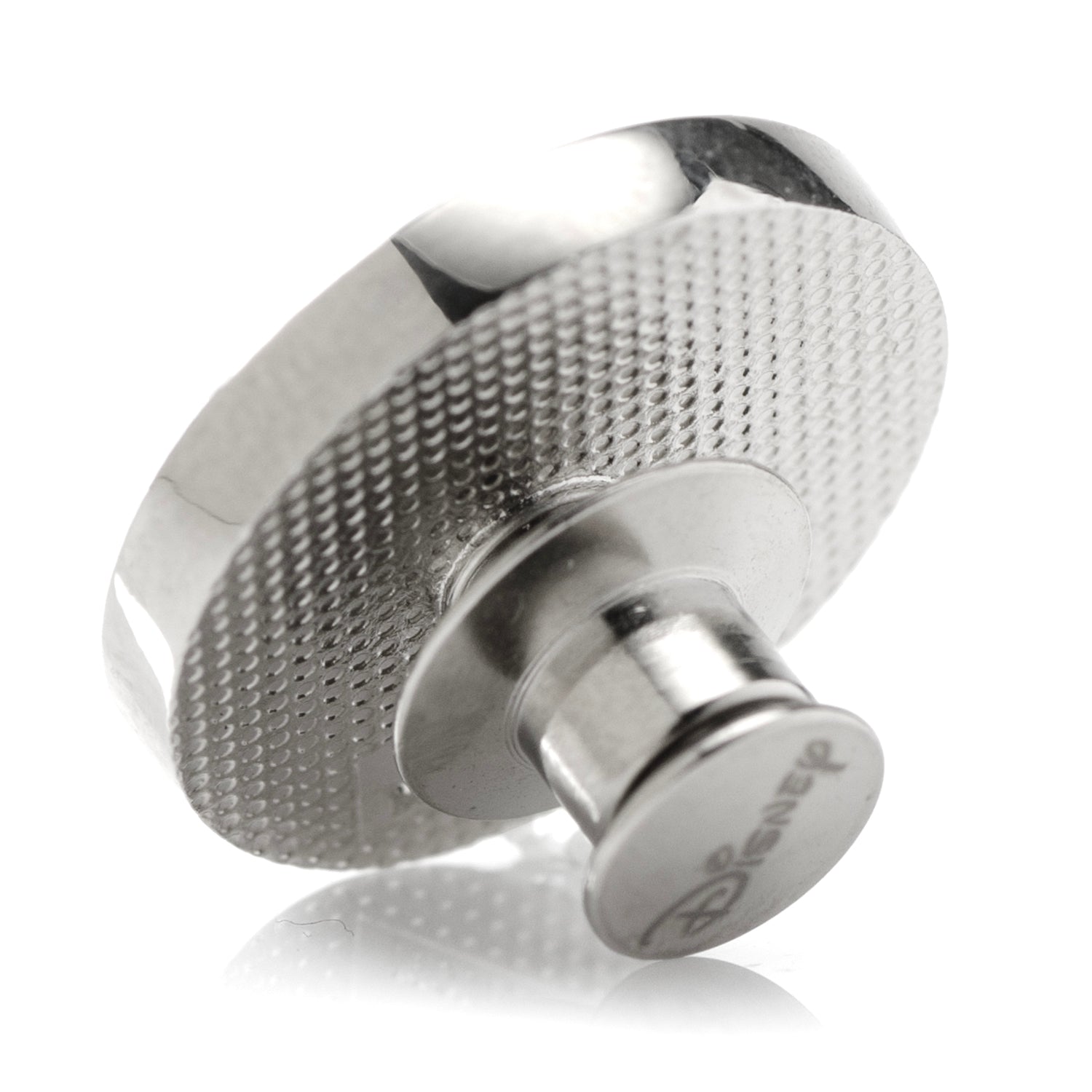 Metallic knob with textured design on a white background