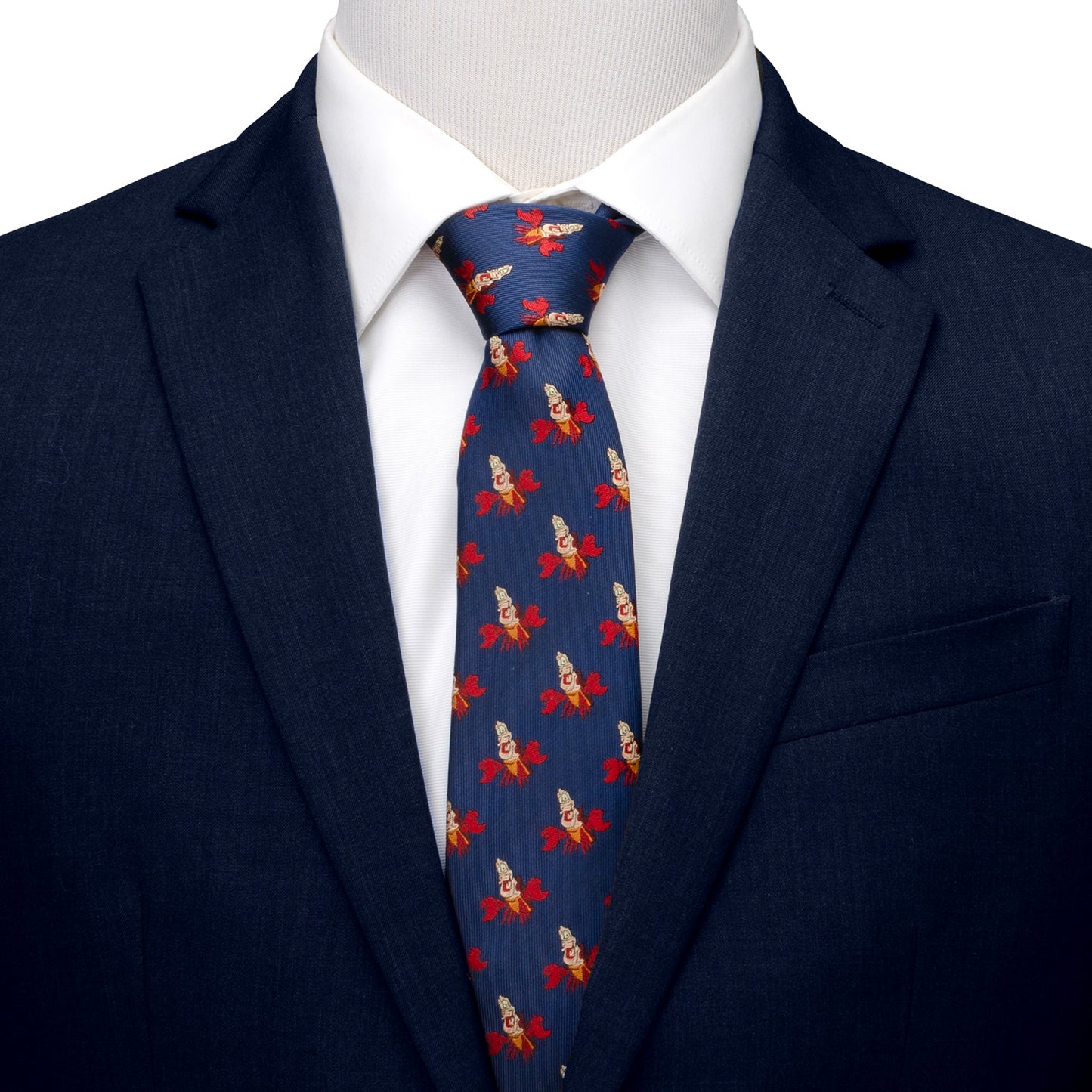 Navy suit with a patterned tie on a white background Little Mermaid Sebastian