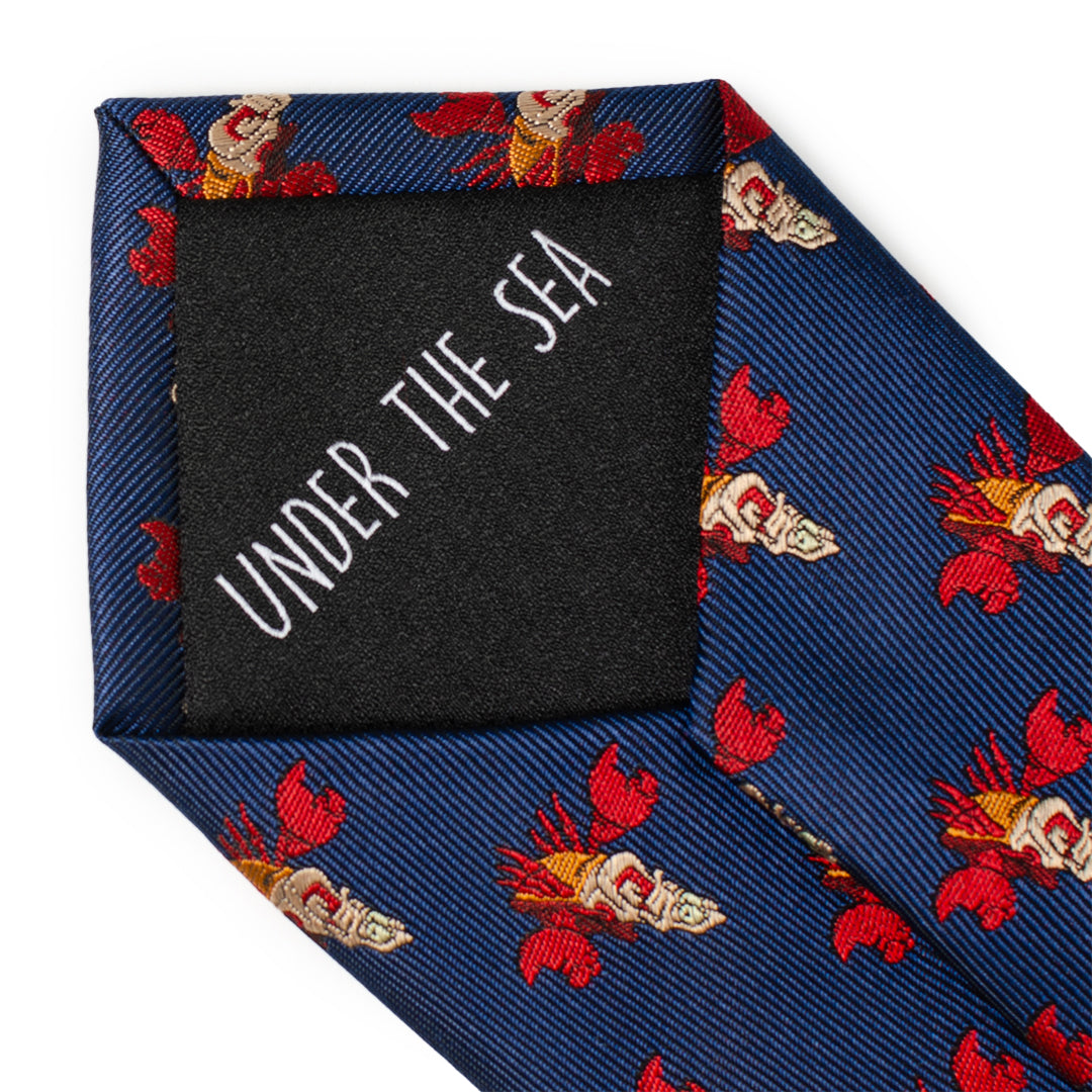 Navy blue pocket square with red and gold lobster pattern and 'Under the Sea' text.