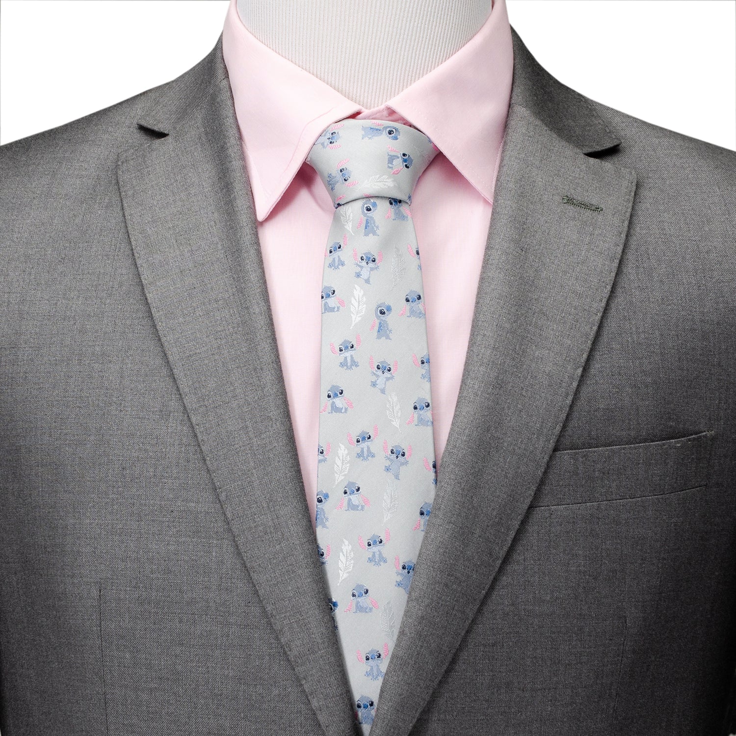 Disney Lilo & Stitch Gray Silk Blend Men’s Tie featuring blue Stitch and feather motifs on a light gray background. Officially licensed by Disney.