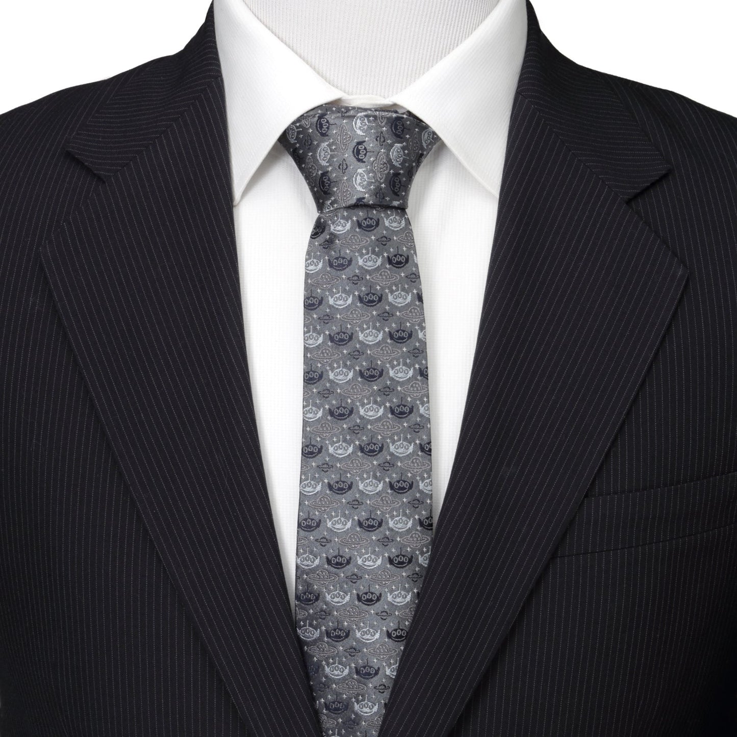 Man wearing a black suit with a patterned gray tie on a white background Toy Story Alien