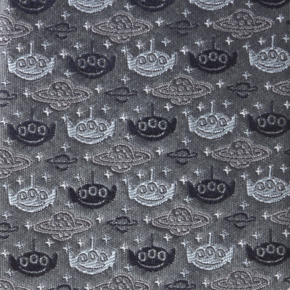 Patterned fabric with UFO shapes on a dark background Toy Story Alien