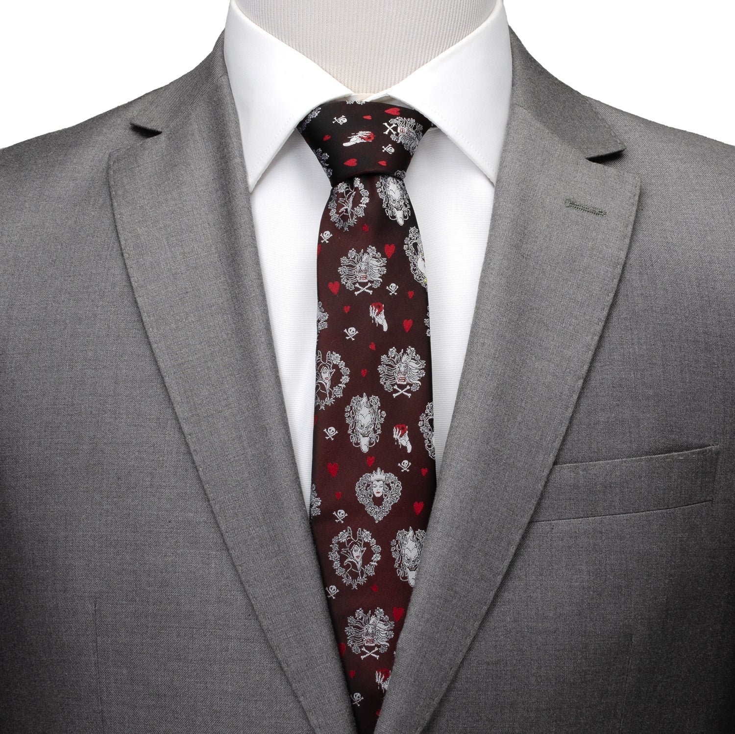 Gray suit with a patterned tie on a mannequin against a white background