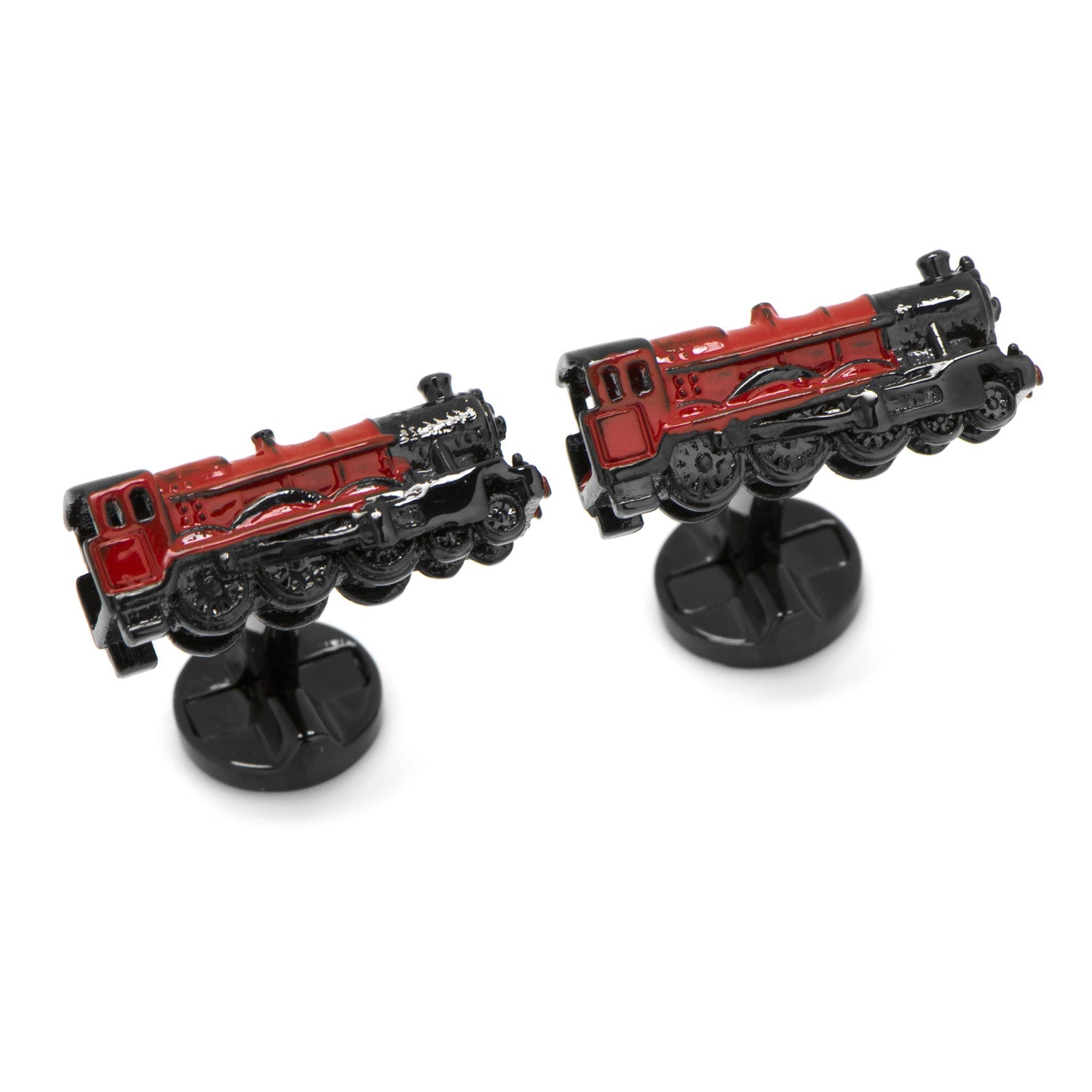 Two red and black train model toys on stands against a white background