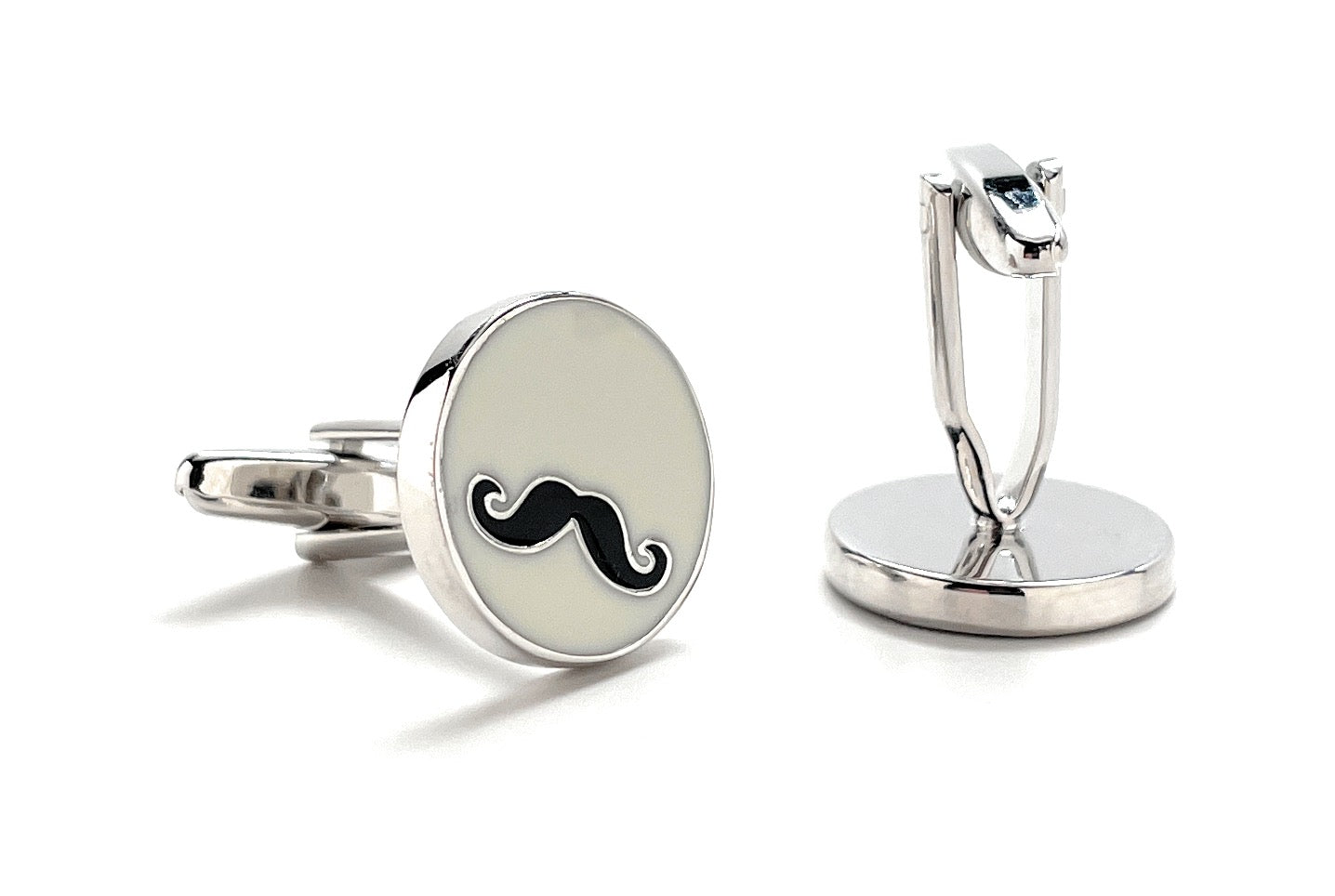 Silver cufflinks with a black mustache design on a white background