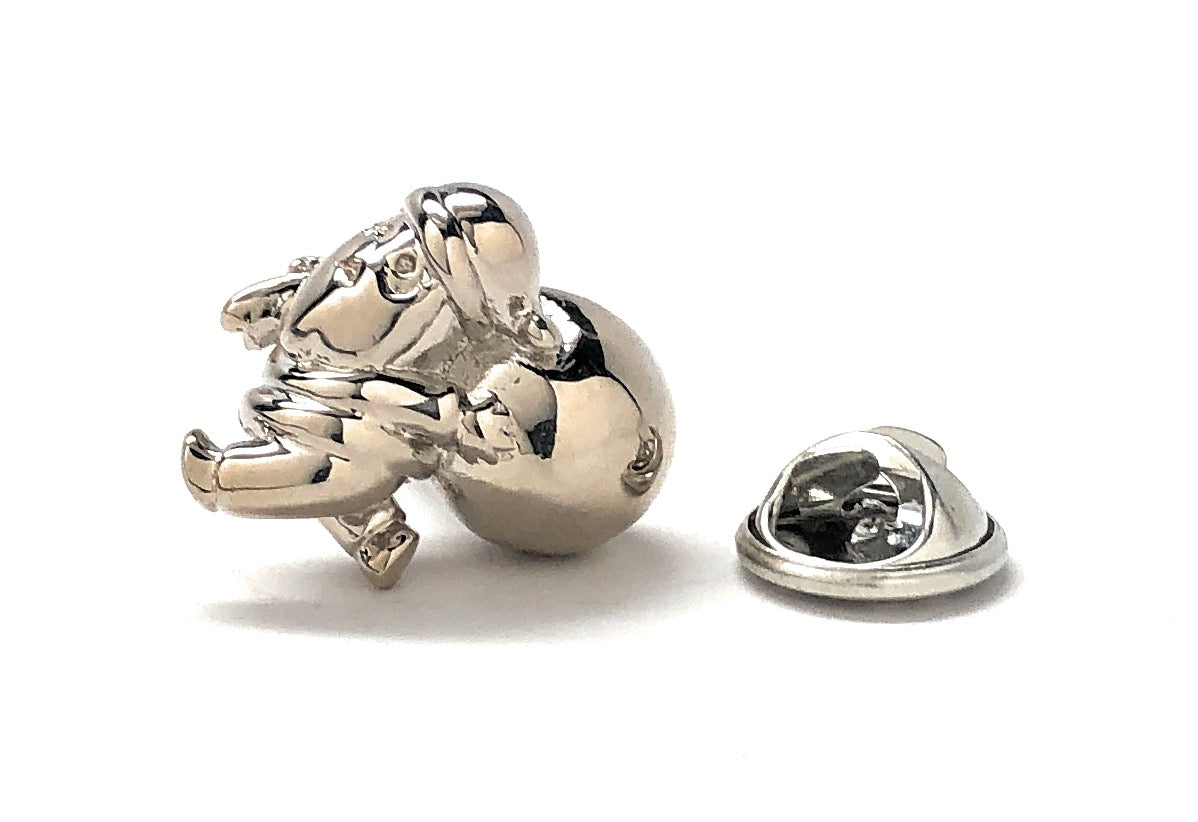 Silver santa claus lapel pin on a white background
