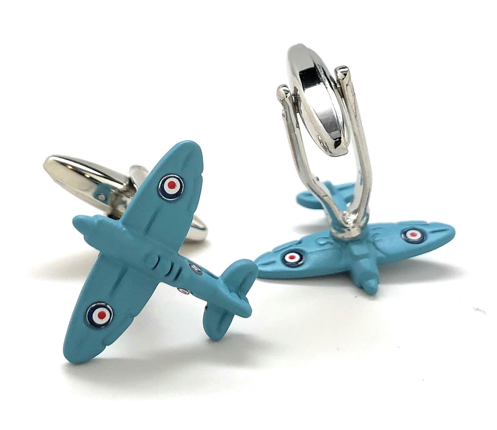 Blue airplane-shaped cufflinks with silver loops on a white background